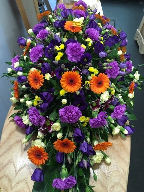 vibrant coffin flowers