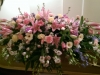 Cascading mixed flower coffin tribute