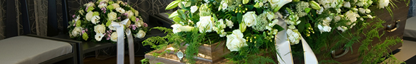 casket spray with white flowers